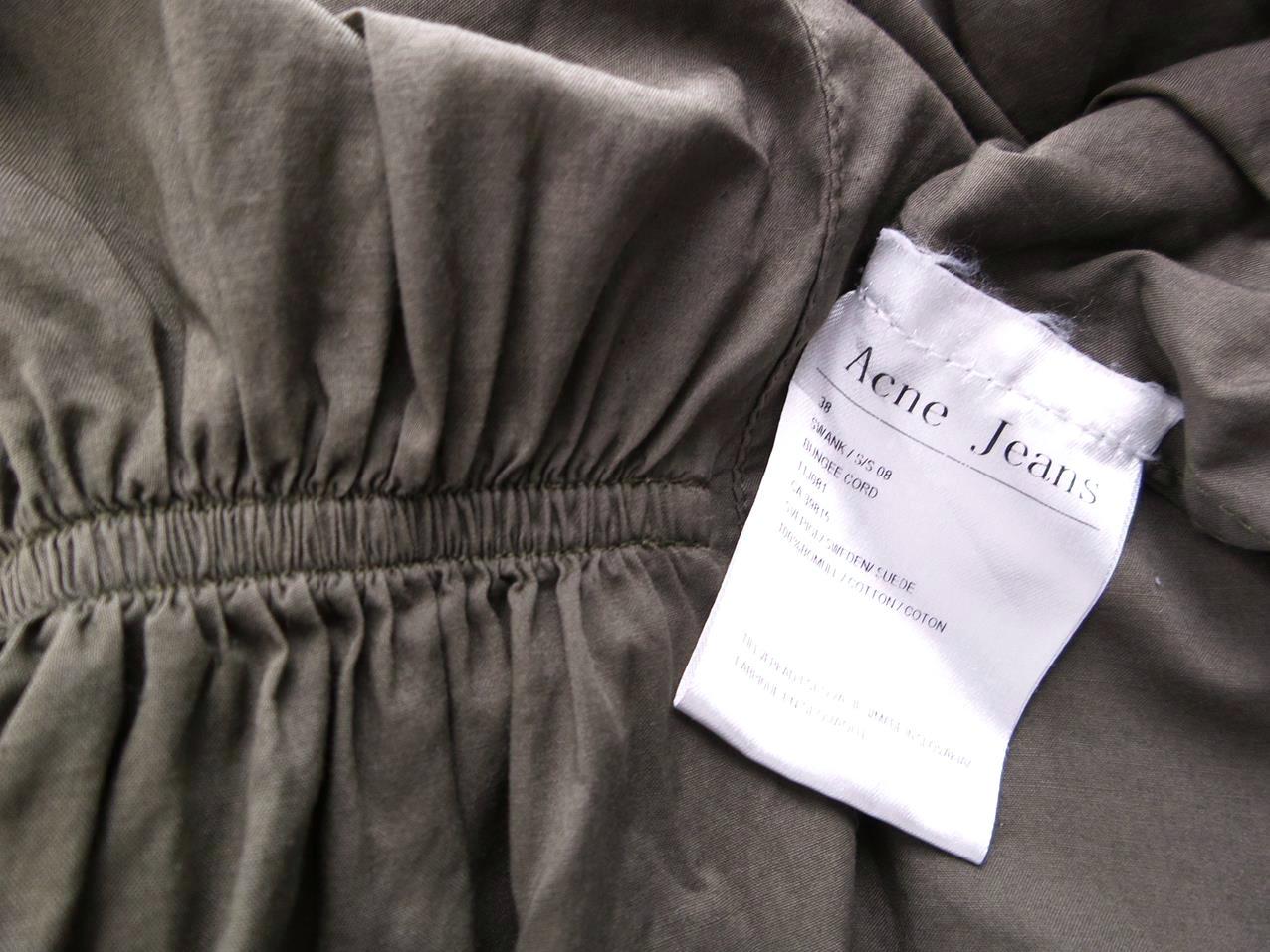 ACNE JEANS Rozmiar 38 Kolor Zielony W serek Tunika Zapinana Bluzka Krótki rękaw Materiał Bawełna 100% ACNE JEANS Rozmiar 38 Kolor Zielony W serek Tunika Zapinana Bluzka Krótki rękaw Materiał Bawełna 100%