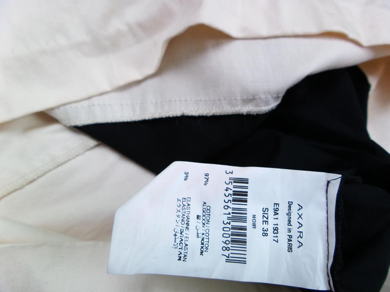 Axara Paris Rozmiar 38 Kolor Czarny Okrągły dekolt Sukienka Prostokątna Bezrękawnik Do Kolan Materiał Bawełna Axara Paris Rozmiar 38 Kolor Czarny Okrągły dekolt Sukienka Prostokątna Bezrękawnik Do Kolan Materiał Bawełna