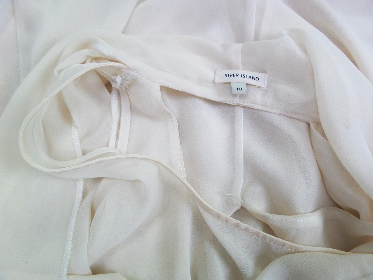 River island Rozmiar 10 (38) Kolor Kremowy Drapowany dekolt Tunika Bluzka Bezrękawnik River island Rozmiar 10 (38) Kolor Kremowy Drapowany dekolt Tunika Bluzka Bezrękawnik