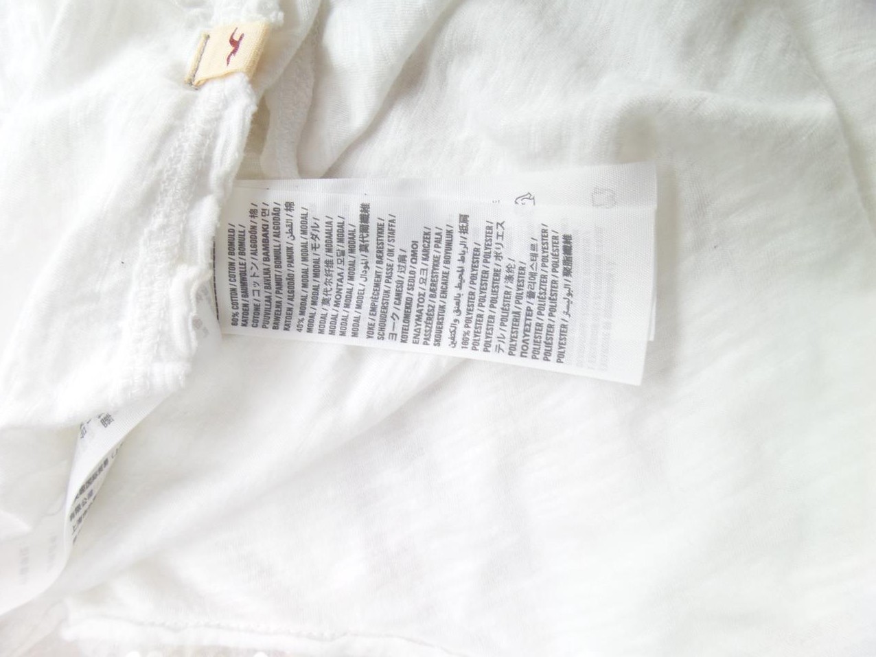 Hollister Rozmiar XS Kolor Biały Okrągły dekolt Bluzka Bezrękawnik Materiał Bawełna