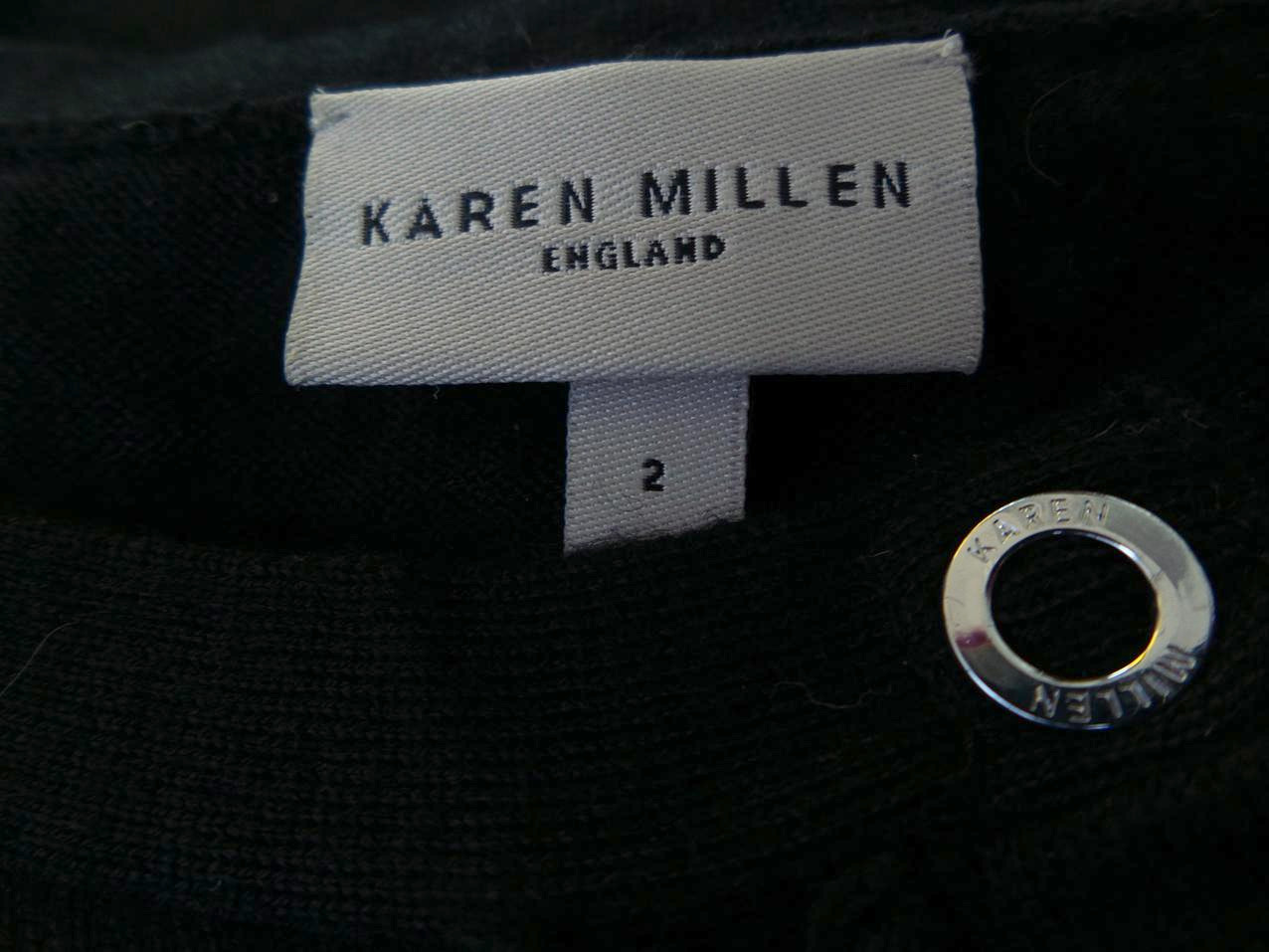 Karen MILLEN Rozmiar 2 Kolor Czarny Dekolt U Tunika Zapinana Bluzka Bezrękawnik Materiał Wełna Karen MILLEN Rozmiar 2 Kolor Czarny Dekolt U Tunika Zapinana Bluzka Bezrękawnik Materiał Wełna