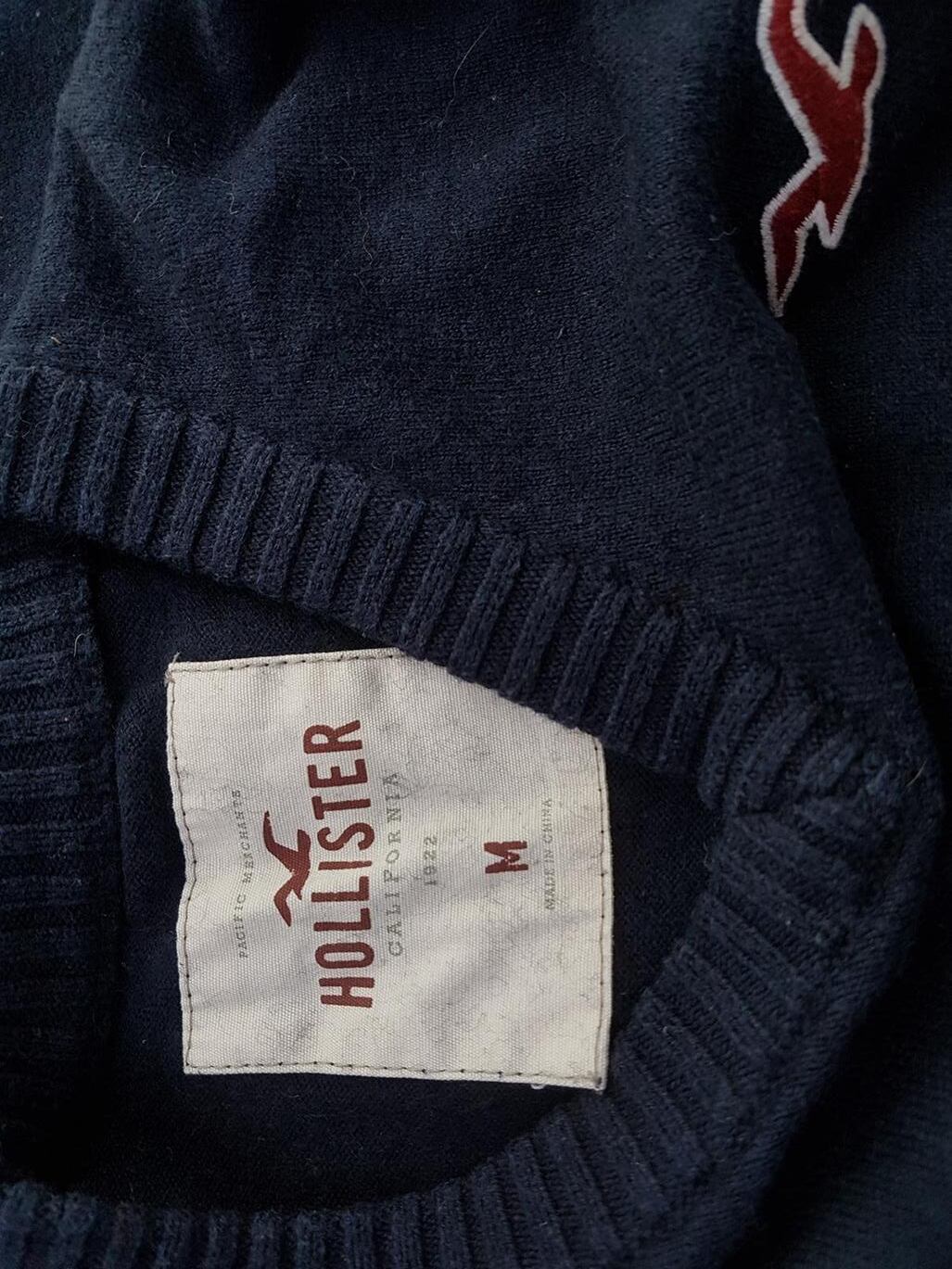 Hollister Rozmiar M Kolor Granatowy W serek Sweter Długi rękaw Materiał Bawełna Hollister Rozmiar M Kolor Granatowy W serek Sweter Długi rękaw Materiał Bawełna