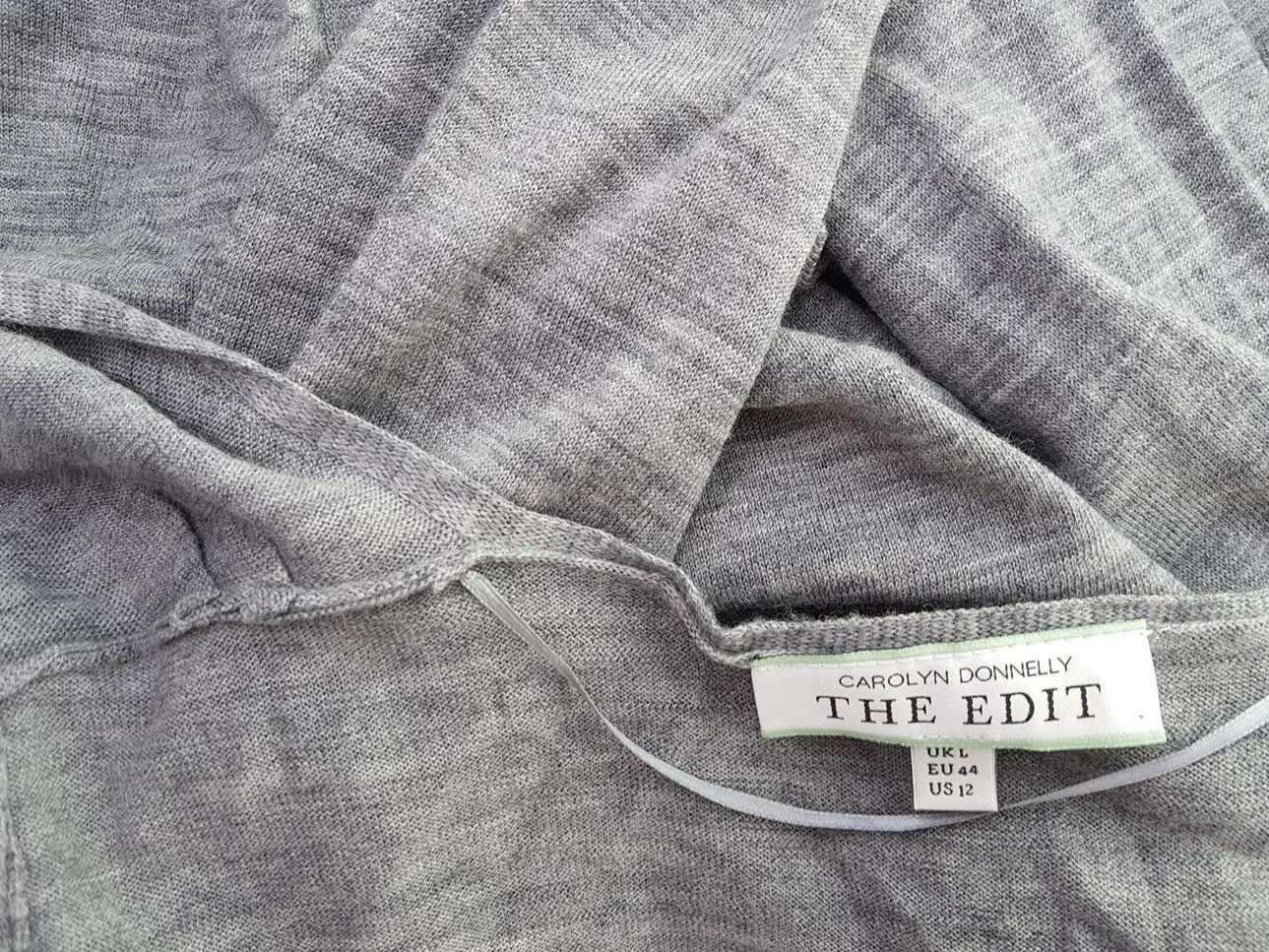 Carolyn Donnelly The Edit Rozmiar 44 Kolor Szary Głęboki Serek Tunika Wiązana z Przodu Bluzka Długi rękaw Materiał Wełna 100% Carolyn Donnelly The Edit Rozmiar 44 Kolor Szary Głęboki Serek Tunika Wiązana z Przodu Bluzka Długi rękaw Materiał Wełna 100%