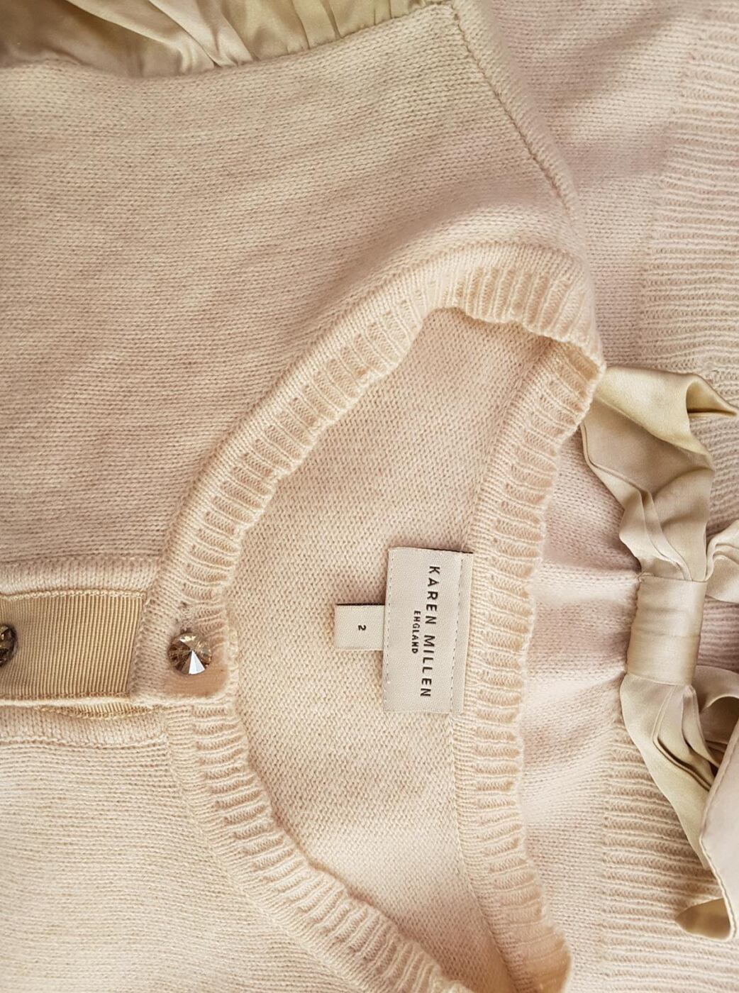 20190814_133246.jpg KAREN MILLEN Rozmiar 34(2) Kolor Kremowy Crew Neck Bluzka Zapinana Krótki rękaw Materiał Kaszmir