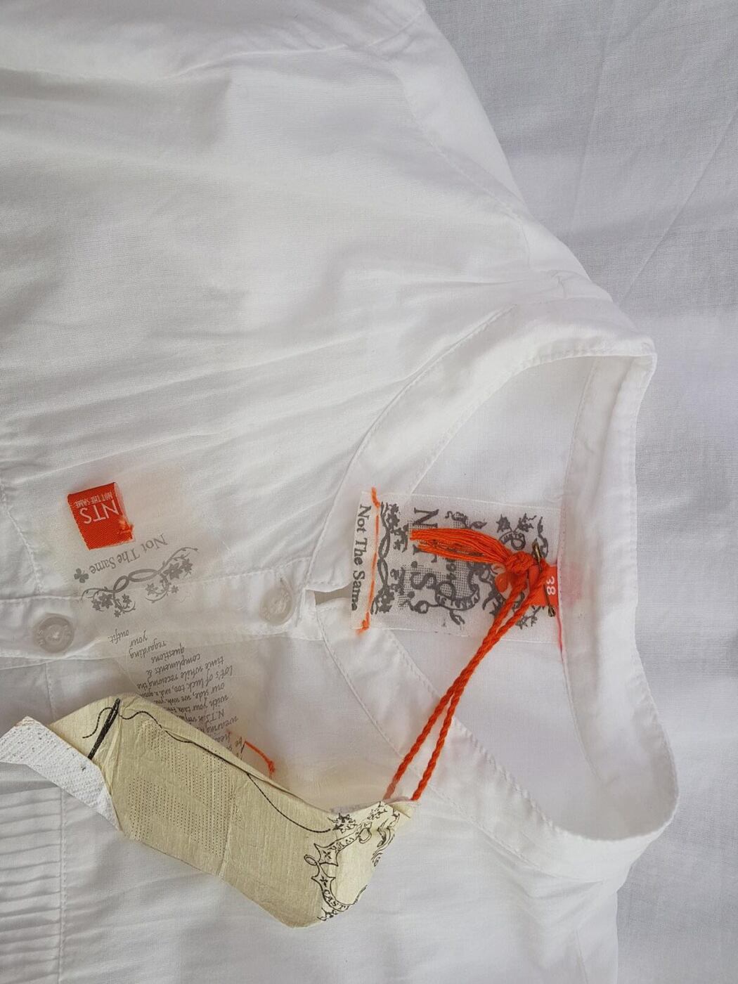 NTS Rozmiar 38 Kolor Biały Kołnierz Tunika Zapinana Bluzka Długi rękaw Materiał Bawełna 100% NTS Rozmiar 38 Kolor Biały Kołnierz Tunika Zapinana Bluzka Długi rękaw Materiał Bawełna 100%