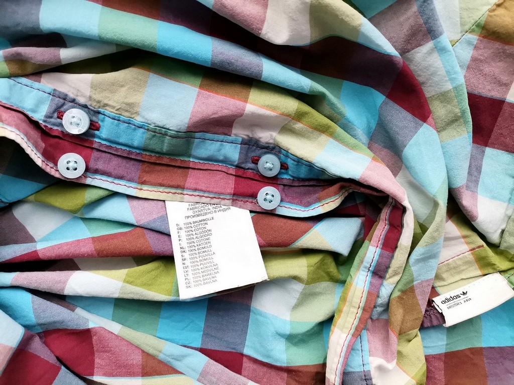 Adidas Rozmiar 34 Kolor Kolorowa Krata Kołnierz Tunika Zapinana Bluzka Krótki rękaw Materiał Bawełna 100% Adidas Rozmiar 34 Kolor Kolorowa Krata Kołnierz Tunika Zapinana Bluzka Krótki rękaw Materiał Bawełna 100%