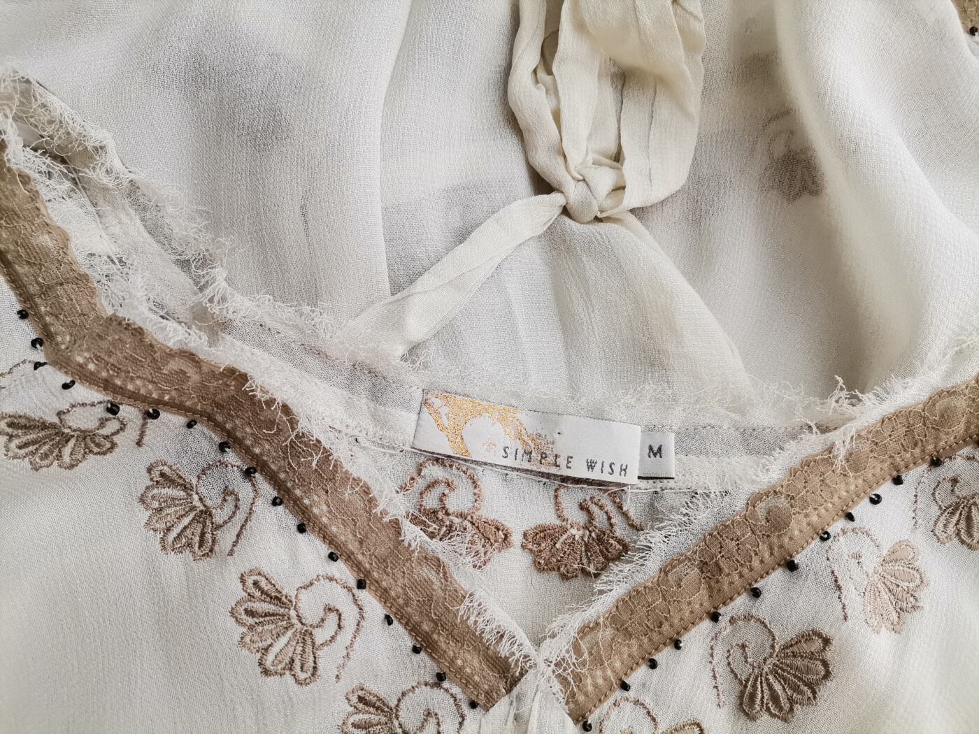 Simple wish Rozmiar M Kolor Beżowy W serek Bluzka Bezrękawnik