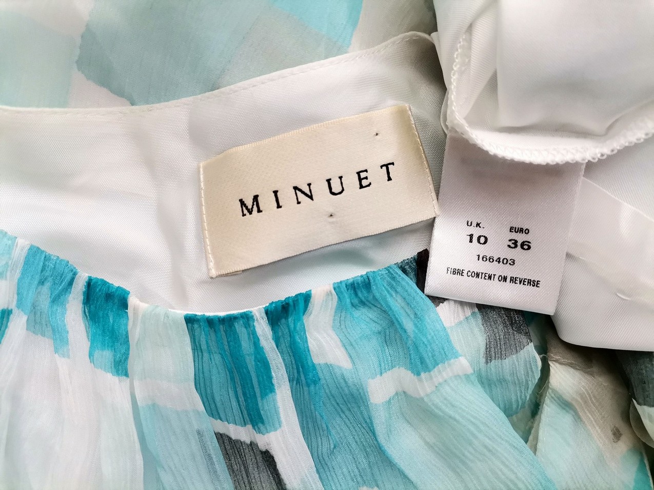 Minuet Rozmiar 10 (36) Kolor Turkusowy Okrągły dekolt Sukienka Sheath Bezrękawnik Midi Materiał Jedwab 100% Minuet Rozmiar 10 (36) Kolor Turkusowy Okrągły dekolt Sukienka Sheath Bezrękawnik Midi Materiał Jedwab 100%