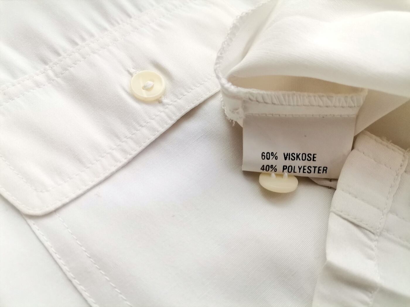 B Vintage Rozmiar 34 Kolor Biały Kołnierz Tunika Zapinana Bluzka Bezrękawnik Materiał Wiskoza B Vintage Rozmiar 34 Kolor Biały Kołnierz Tunika Zapinana Bluzka Bezrękawnik Materiał Wiskoza