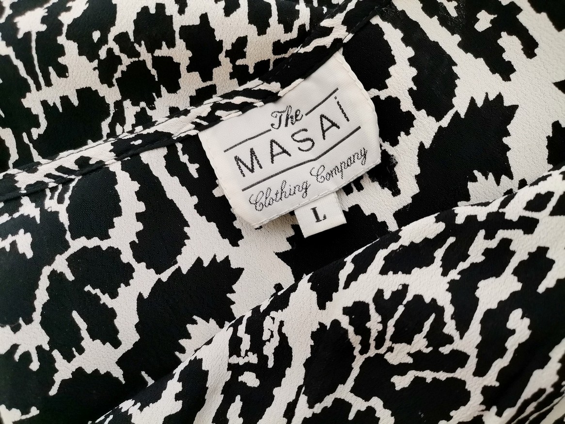 The Masai Rozmiar L Kolor Czarny Panterka W serek Tunika Bluzka Rękaw 3/4 Materiał Wiskoza 100% The Masai Rozmiar L Kolor Czarny Panterka W serek Tunika Bluzka Rękaw 3/4 Materiał Wiskoza 100%