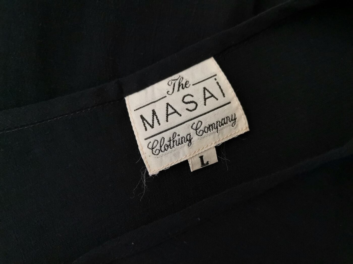 The Masai Rozmiar L Kolor Czarny Okrągły dekolt Tunika Bluzka Bezrękawnik Materiał Wiskoza 100% The Masai Rozmiar L Kolor Czarny Okrągły dekolt Tunika Bluzka Bezrękawnik Materiał Wiskoza 100%