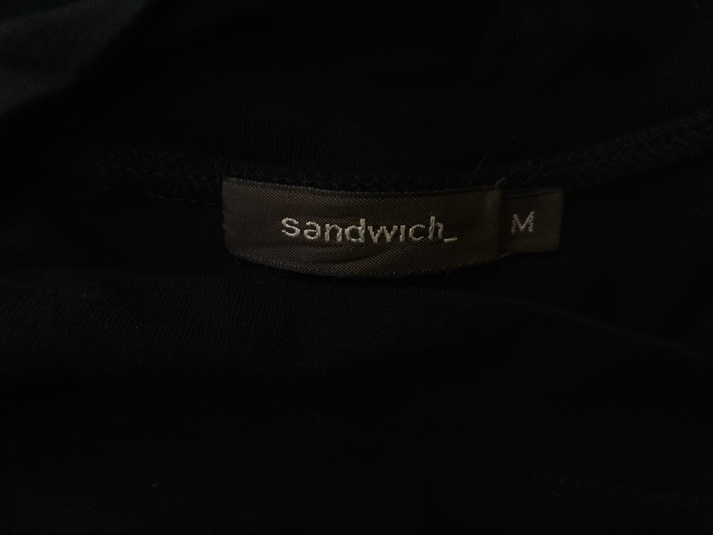 Sandwich Rozmiar M Kolor Czarny W serek Sukienka Zawijana Rękaw 3/4 Midi Materiał Rayon Sandwich Rozmiar M Kolor Czarny W serek Sukienka Zawijana Rękaw 3/4 Midi Materiał Rayon
