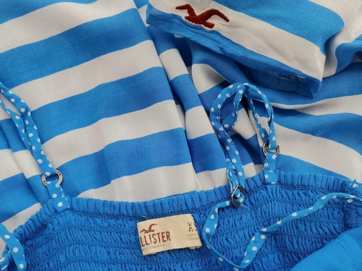 Hollister Rozmiar XS Kolor Niebieski Pasy W serek Tunika Bluzka Bezrękawnik Materiał Wiskoza 100% Hollister Rozmiar XS Kolor Niebieski Pasy W serek Tunika Bluzka Bezrękawnik Materiał Wiskoza 100%