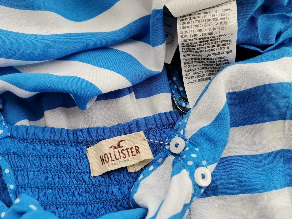Hollister Rozmiar XS Kolor Niebieski Pasy W serek Tunika Bluzka Bezrękawnik Materiał Wiskoza 100% Hollister Rozmiar XS Kolor Niebieski Pasy W serek Tunika Bluzka Bezrękawnik Materiał Wiskoza 100%