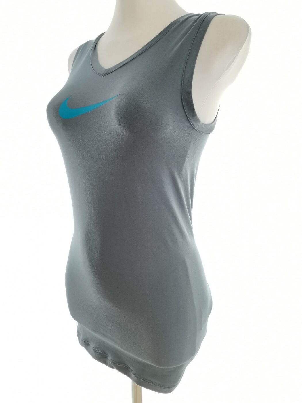 IMG_20210423_115703.jpg Nike Rozmiar XS Kolor Szary Okrągły dekolt Bluzka Bezrękawnik
