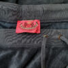 Juicy couture Rozmiar 38 Kolor Granatowy Spodnie Casual Materiał Bawełna
