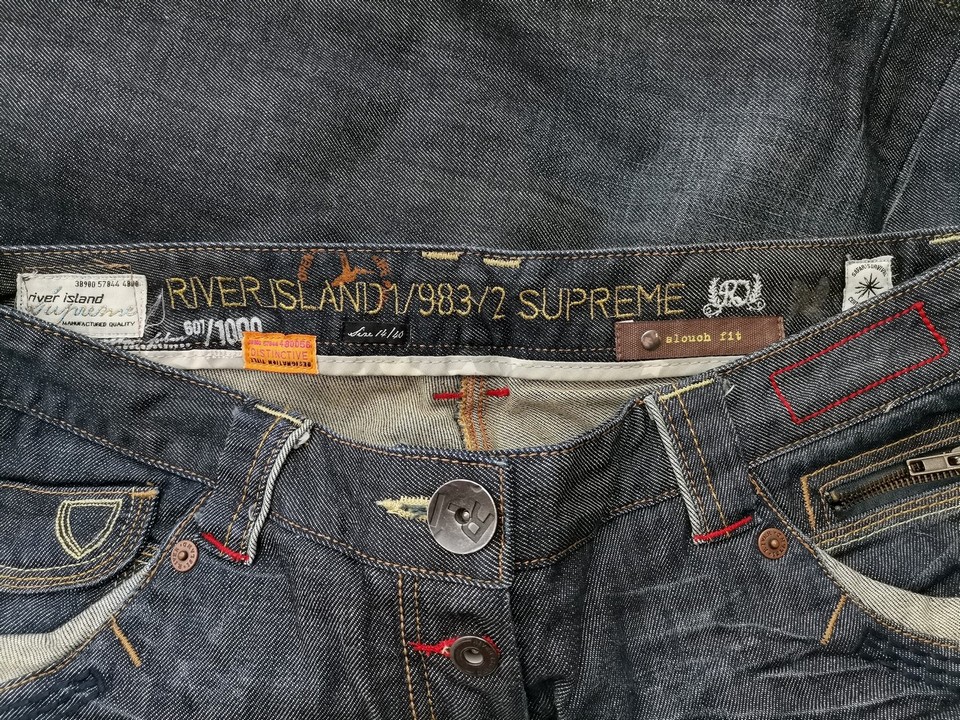 River island Rozmiar 14 (40) Kolor Granatowy Spodnie Jeansy Materiał Bawełna