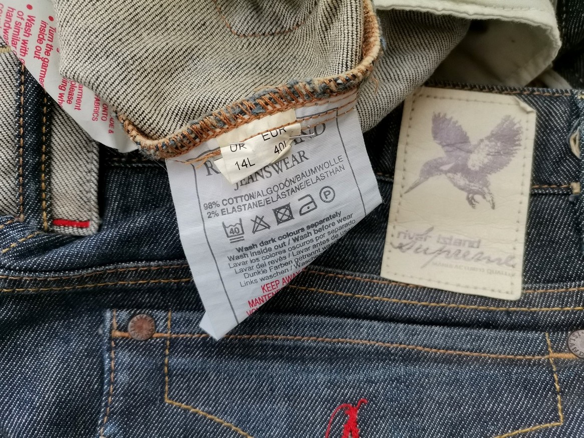River island Rozmiar 14 (40) Kolor Granatowy Spodnie Jeansy Materiał Bawełna