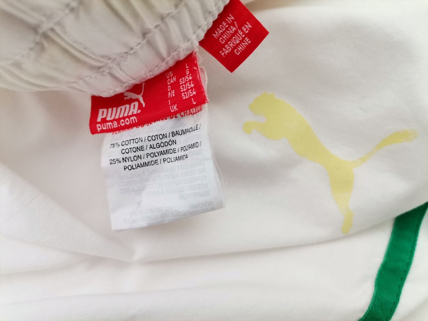 IMG_20210510_124907.jpg Puma Rozmiar L (52/54) Kolor Biały Spodnie Rybaczki Materiał Bawełna