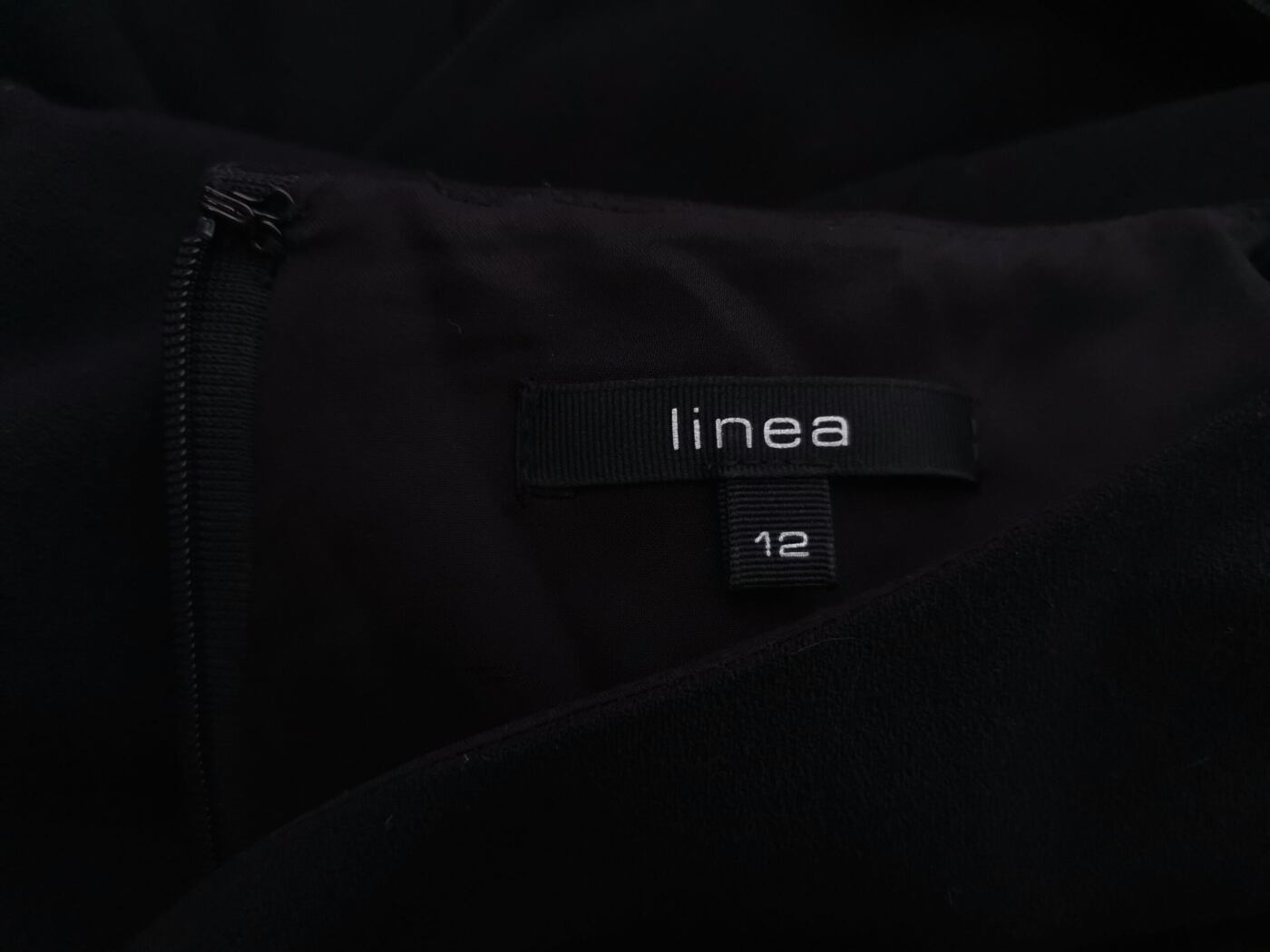 Linea Rozmiar 12 (40) Kolor Czarny Okrągły dekolt Sukienka Sheath Bezrękawnik Midi Linea Rozmiar 12 (40) Kolor Czarny Okrągły dekolt Sukienka Sheath Bezrękawnik Midi