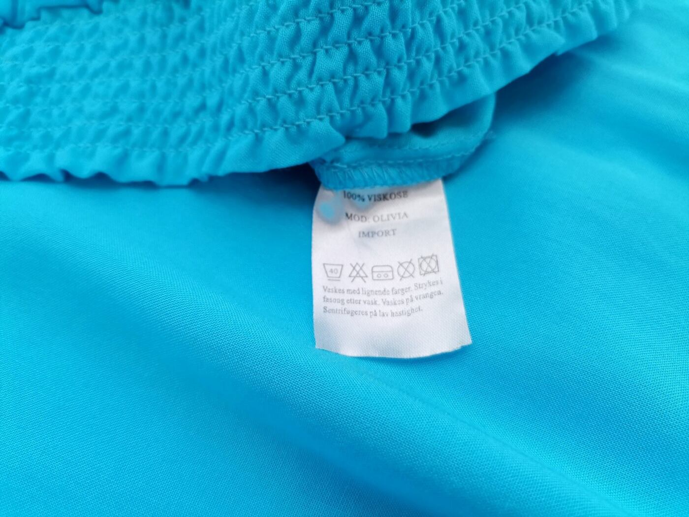 IMG_20210629_133245.jpg Zavanna Rozmiar 42 Kolor Niebieski Split Crew Neck Bluzka Zapinana Rękaw 3/4 Materiał Wiskoza 100%
