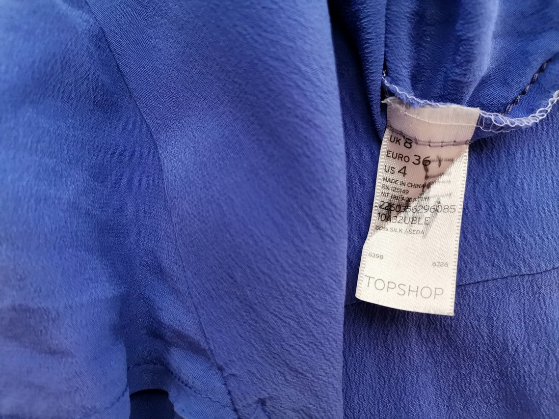 Topshop Rozmiar 36 Kolor Niebieski Okrągły dekolt Tunika Bluzka Krótki rękaw Materiał Jedwab 100% Topshop Rozmiar 36 Kolor Niebieski Okrągły dekolt Tunika Bluzka Krótki rękaw Materiał Jedwab 100%