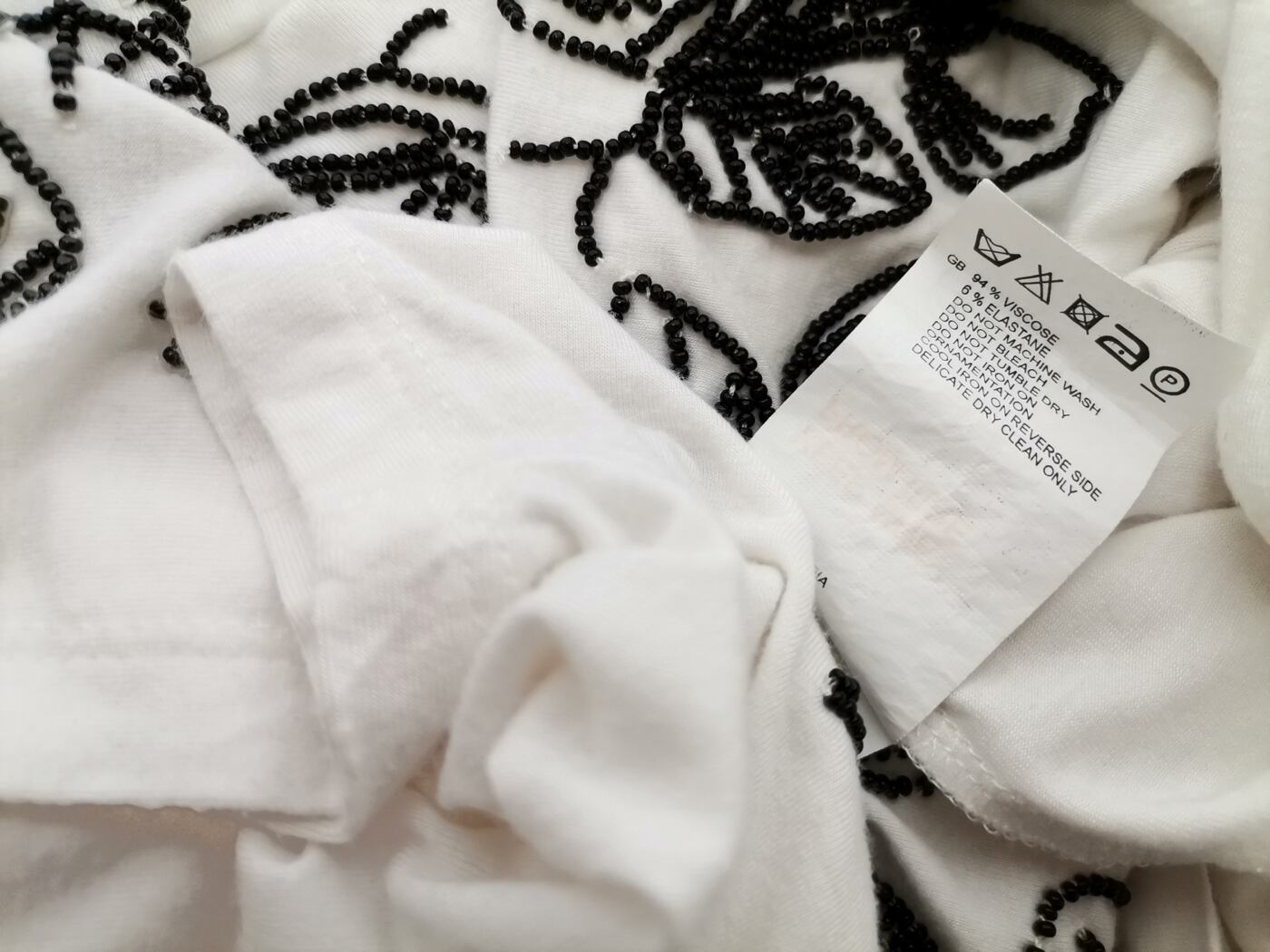 Reiss Rozmiar L Kolor Biały Roślinny Liście Okrągły dekolt Tunika Bluzka Krótki rękaw Materiał Wiskoza Reiss Rozmiar L Kolor Biały Roślinny Liście Okrągły dekolt Tunika Bluzka Krótki rękaw Materiał Wiskoza