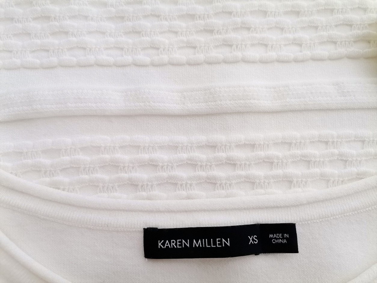 IMG_20210825_135248.jpg Karen MILLEN Rozmiar XS Kolor Kremowy Okrągły dekolt Bluzka Rękaw 3/4 Materiał Wiskoza