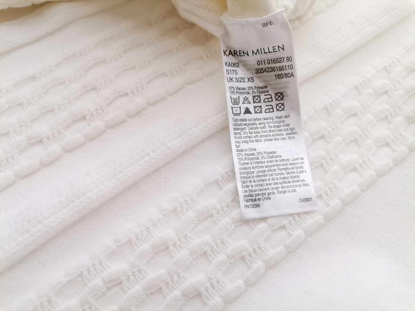 IMG_20210825_135257.jpg Karen MILLEN Rozmiar XS Kolor Kremowy Okrągły dekolt Bluzka Rękaw 3/4 Materiał Wiskoza