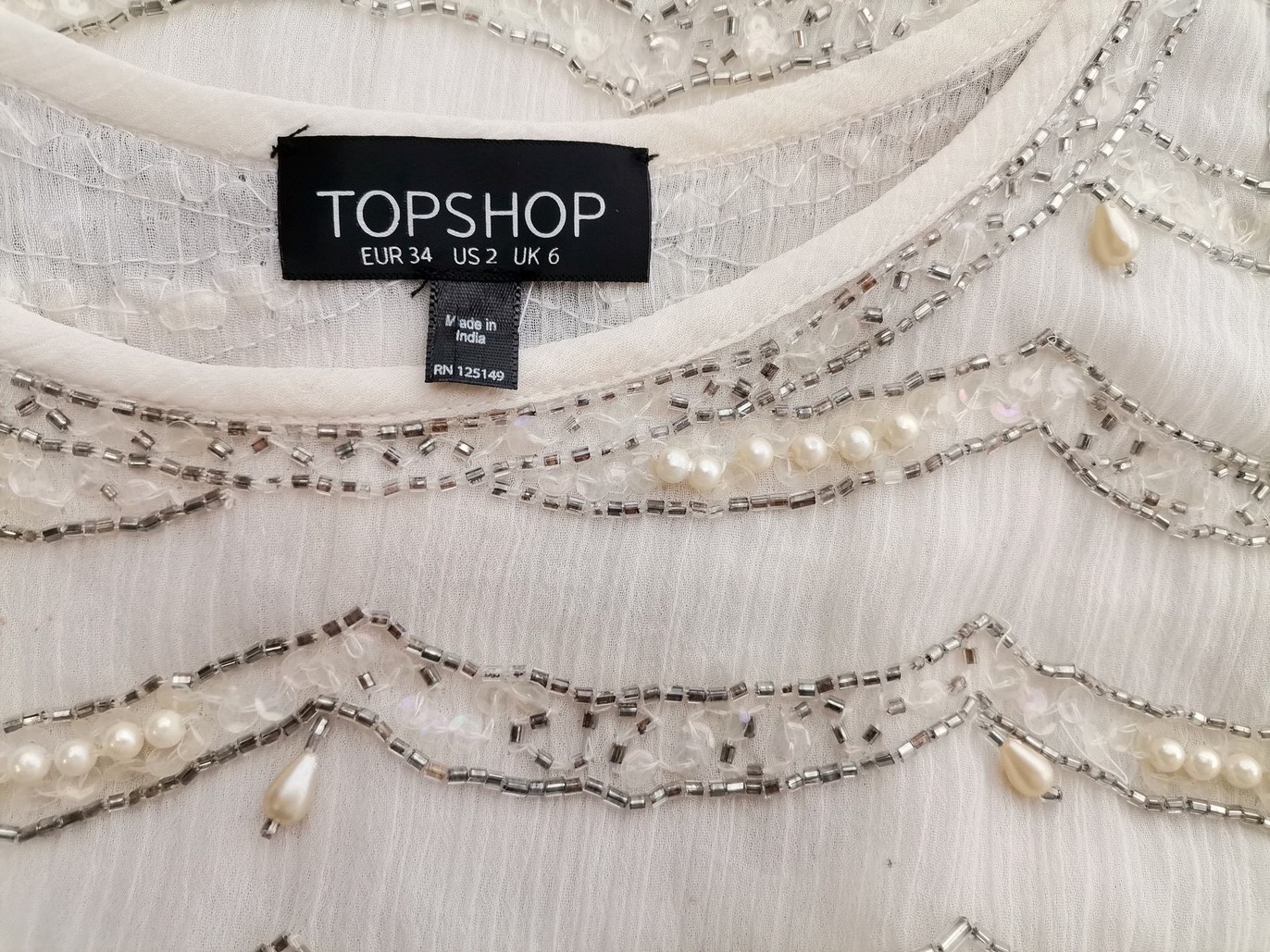 IMG_20211028_130058.jpg Topshop Rozmiar 6 (34) Kolor Kremowy Okrągły dekolt Bluzka Bezrękawnik