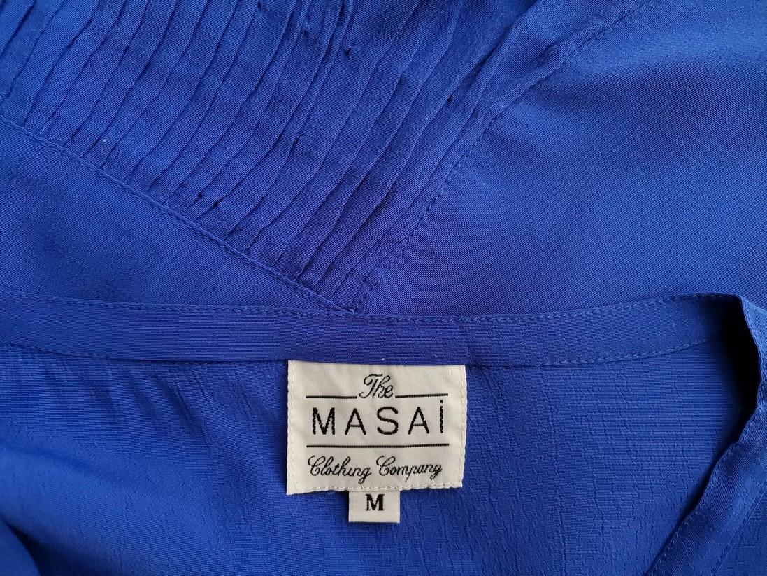 IMG_20211203_131351.jpg The Masai Rozmiar M Kolor Niebieski Okrągły dekolt Bluzka Zapinana Krótki rękaw Materiał Wiskoza 100%