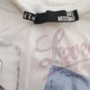 Love Moschino Rozmiar 38 Kolor Biały Okrągły dekolt Bluzka Długi rękaw Materiał Bawełna