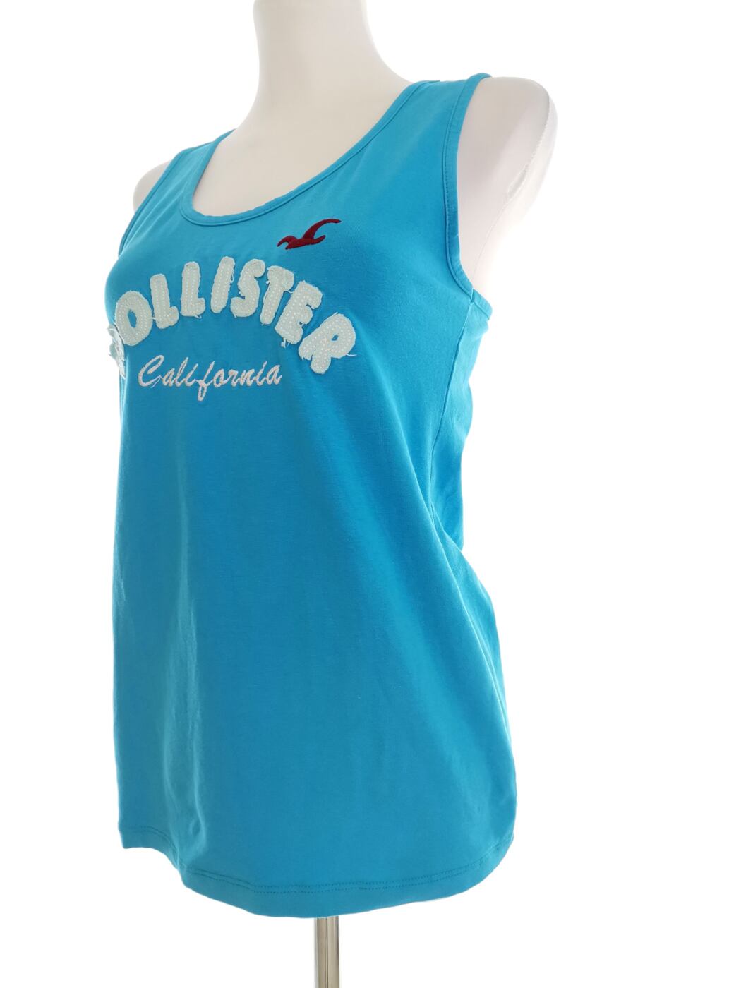 IMG_20220214_134357.jpg Hollister Rozmiar XL Kolor Niebieski Okrągły dekolt Bluzka Bezrękawnik Materiał Bawełna 100%
