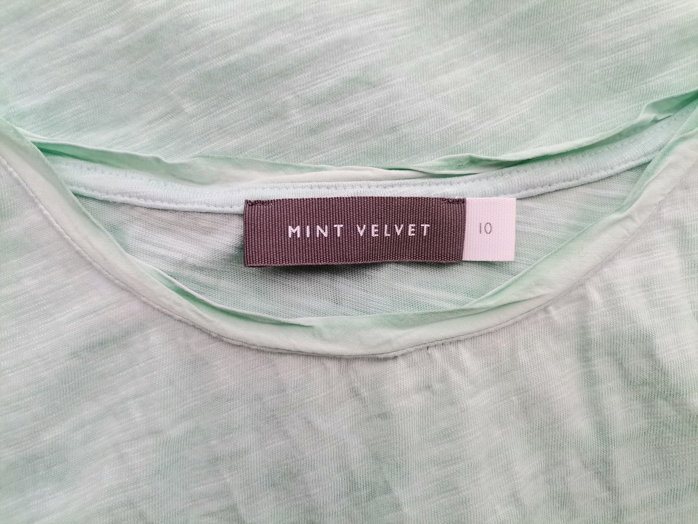 IMG_20220405_121716.jpg Mint Velvet Rozmiar 10 (38) Kolor Miętowy Okrągły dekolt Bluzka Krótki rękaw Materiał Bawełna