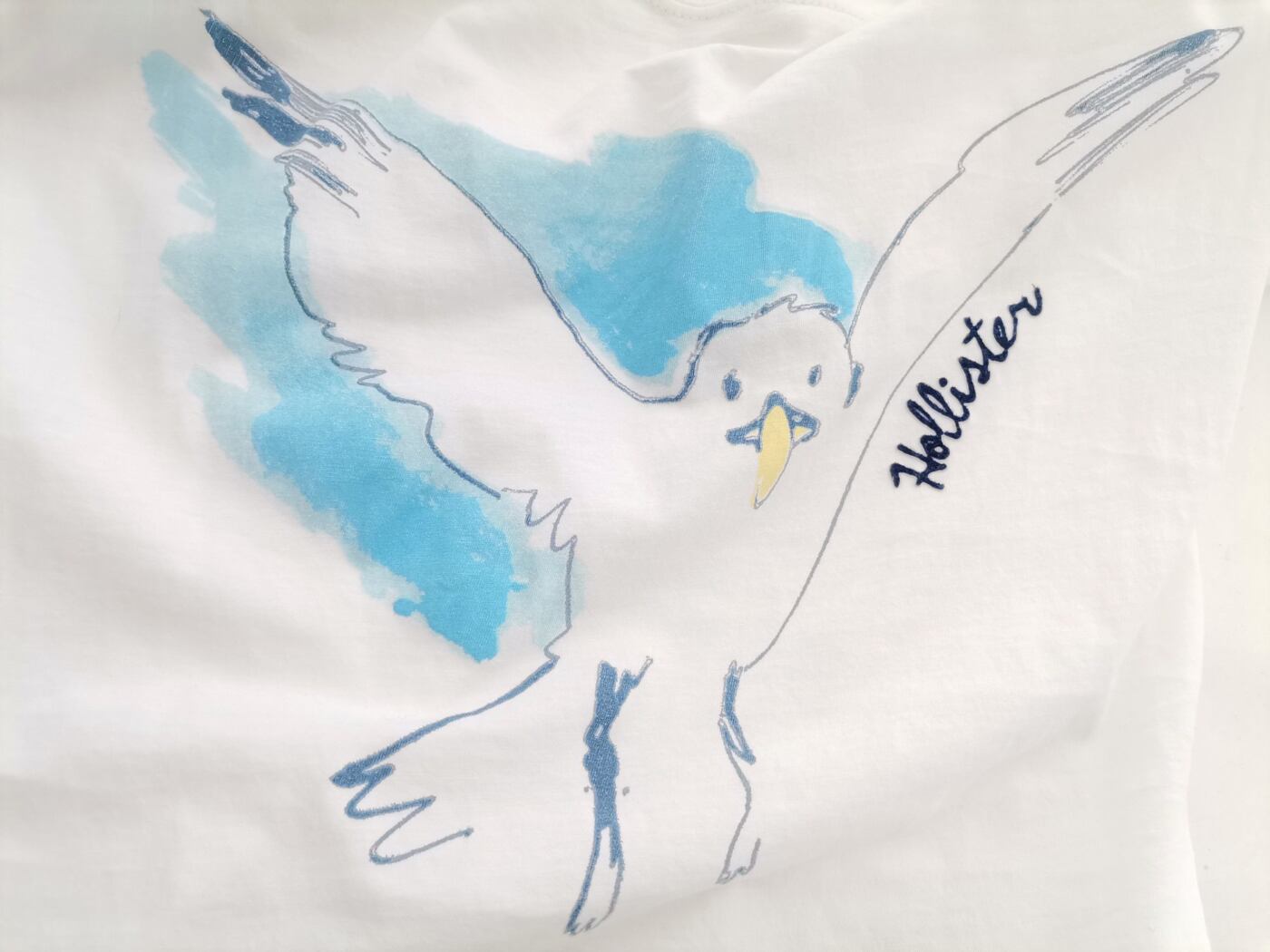 IMG_20220407_123832.jpg Hollister Rozmiar XS Kolor Biały Okrągły dekolt T-Shirt Krótki rękaw Materiał Bawełna 100%