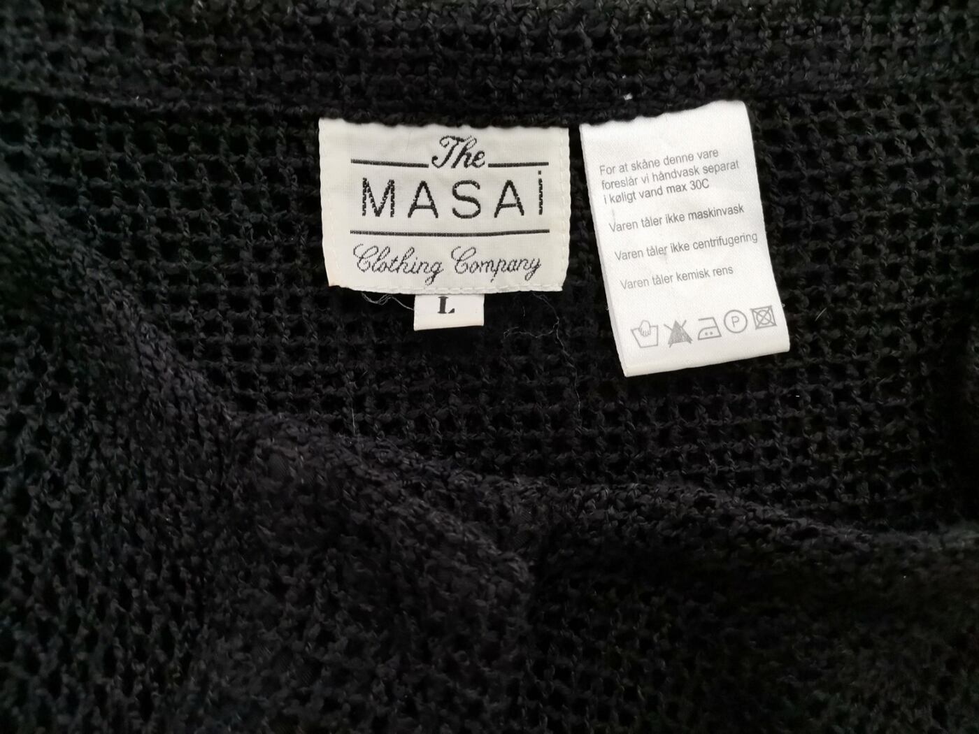 IMG_20220421_110247.jpg The Masai Rozmiar L Kolor Czarny Okrągły dekolt Sweter Rękaw 3/4 Materiał Wiskoza Otwarta dzianina