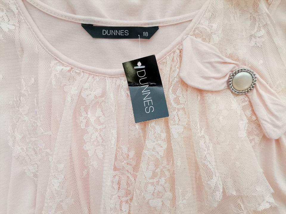 Dunnes Rozmiar 18 (46) Kolor Pudrowy Róż Okrągły dekolt Tunika Bluzka Bezrękawnik Materiał Wiskoza 100% Dunnes Rozmiar 18 (46) Kolor Pudrowy Róż Okrągły dekolt Tunika Bluzka Bezrękawnik Materiał Wiskoza 100%