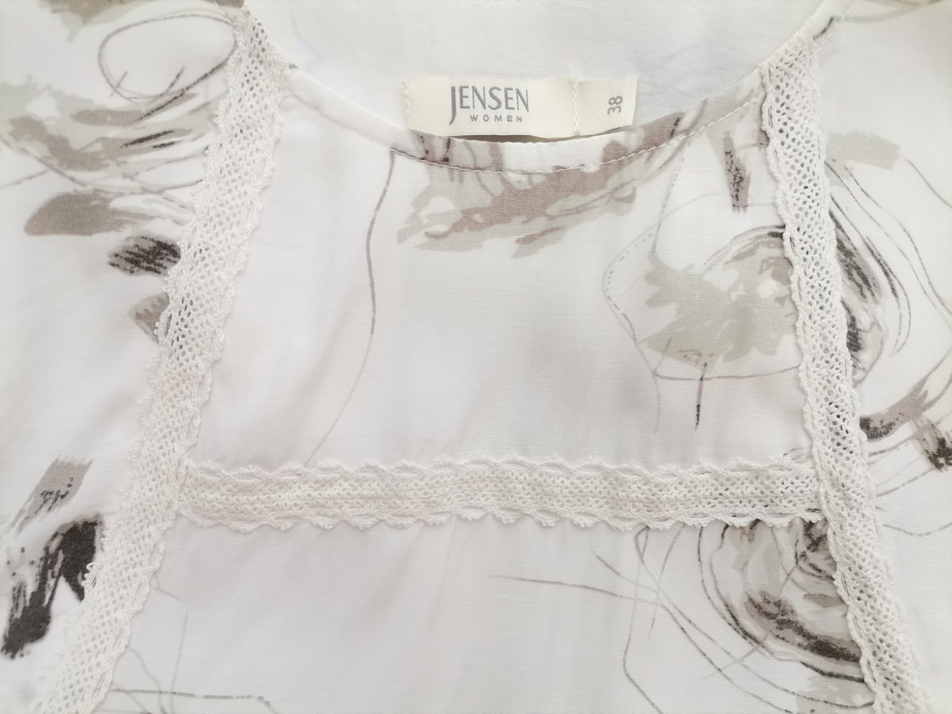 Jensen Rozmiar 38 Kolor Kremowy Okrągły dekolt Tunika Bluzka Bezrękawnik Materiał Wiskoza 100% Jensen Rozmiar 38 Kolor Kremowy Okrągły dekolt Tunika Bluzka Bezrękawnik Materiał Wiskoza 100%