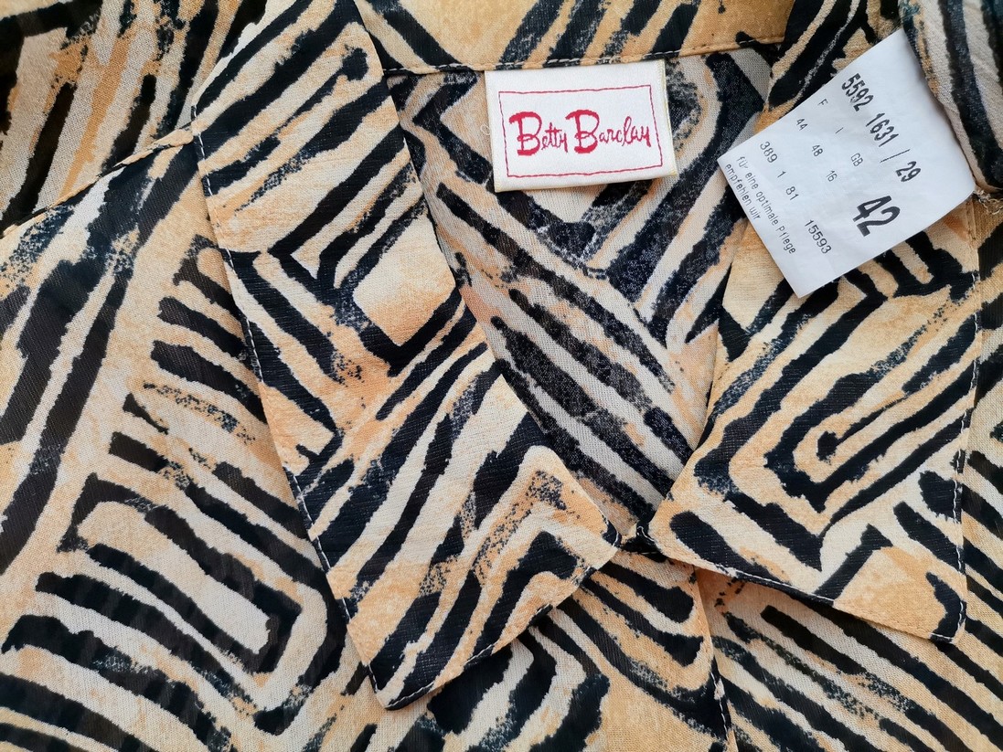 BETTY BARCLAY Rozmiar 42 Kolor Żółty Geometryczny Kołnierz Tunika Zapinana Bluzka Krótki rękaw Materiał Wiskoza 100% BETTY BARCLAY Rozmiar 42 Kolor Żółty Geometryczny Kołnierz Tunika Zapinana Bluzka Krótki rękaw Materiał Wiskoza 100%