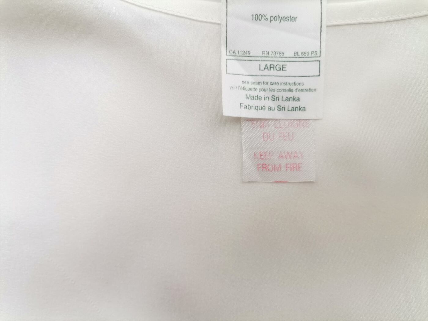 IMG_20220714_133332.jpg Laura ashley Rozmiar L Kolor Perłowy Dekolt U Bluzka Bezrękawnik