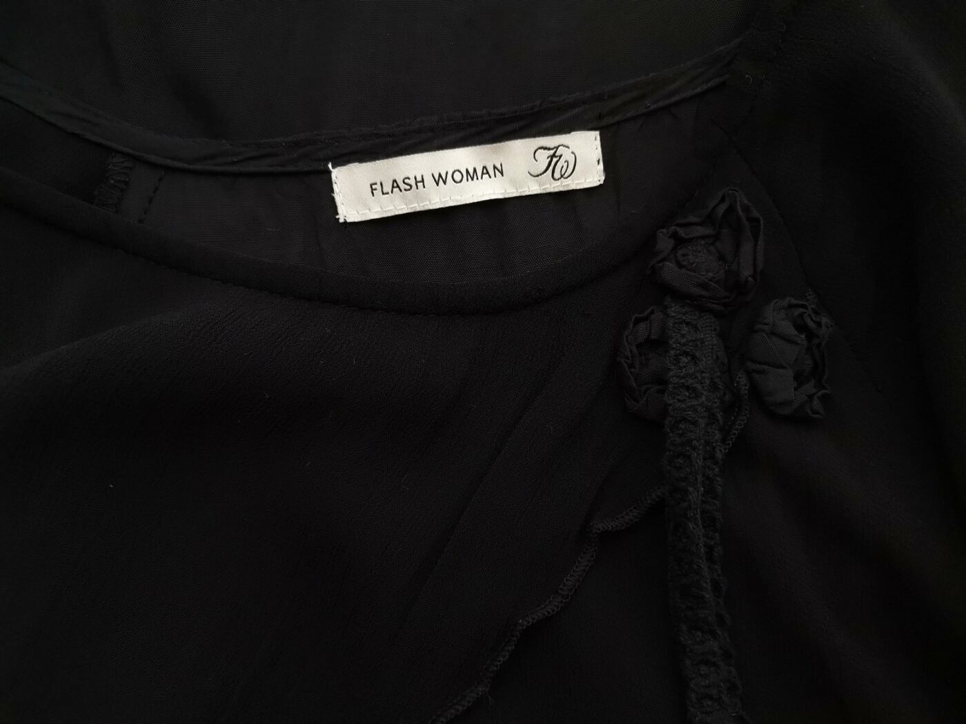 Flash Woman Rozmiar 46/48 Kolor Czarny Okrągły dekolt Tunika Bluzka Krótki rękaw Materiał Wiskoza 100% Flash Woman Rozmiar 46/48 Kolor Czarny Okrągły dekolt Tunika Bluzka Krótki rękaw Materiał Wiskoza 100%