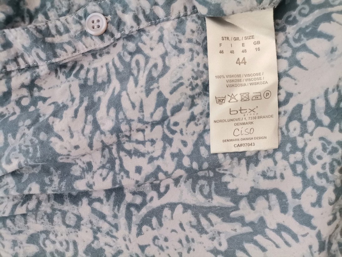 Ciso Rozmiar 44 Kolor Niebieski Roślinny Liście Split Crew Neck Tunika Bluzka Długi rękaw Materiał Wiskoza 100% Ciso Rozmiar 44 Kolor Niebieski Roślinny Liście Split Crew Neck Tunika Bluzka Długi rękaw Materiał Wiskoza 100%