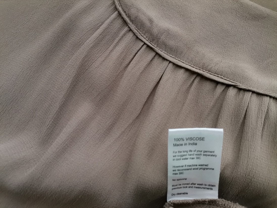 The Masai Rozmiar XL Kolor Szary Okrągły dekolt Tunika Bluzka Krótki rękaw Materiał Wiskoza 100% The Masai Rozmiar XL Kolor Szary Okrągły dekolt Tunika Bluzka Krótki rękaw Materiał Wiskoza 100%