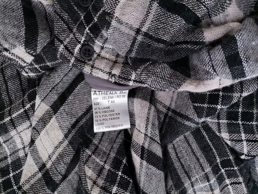 IMG_20210909_114957.jpg Vintage Rozmiar 44 Kolor Czarny Krata Okrągły dekolt Sukienka Sweterkowa Bezrękawnik Midi Materiał Wełna
