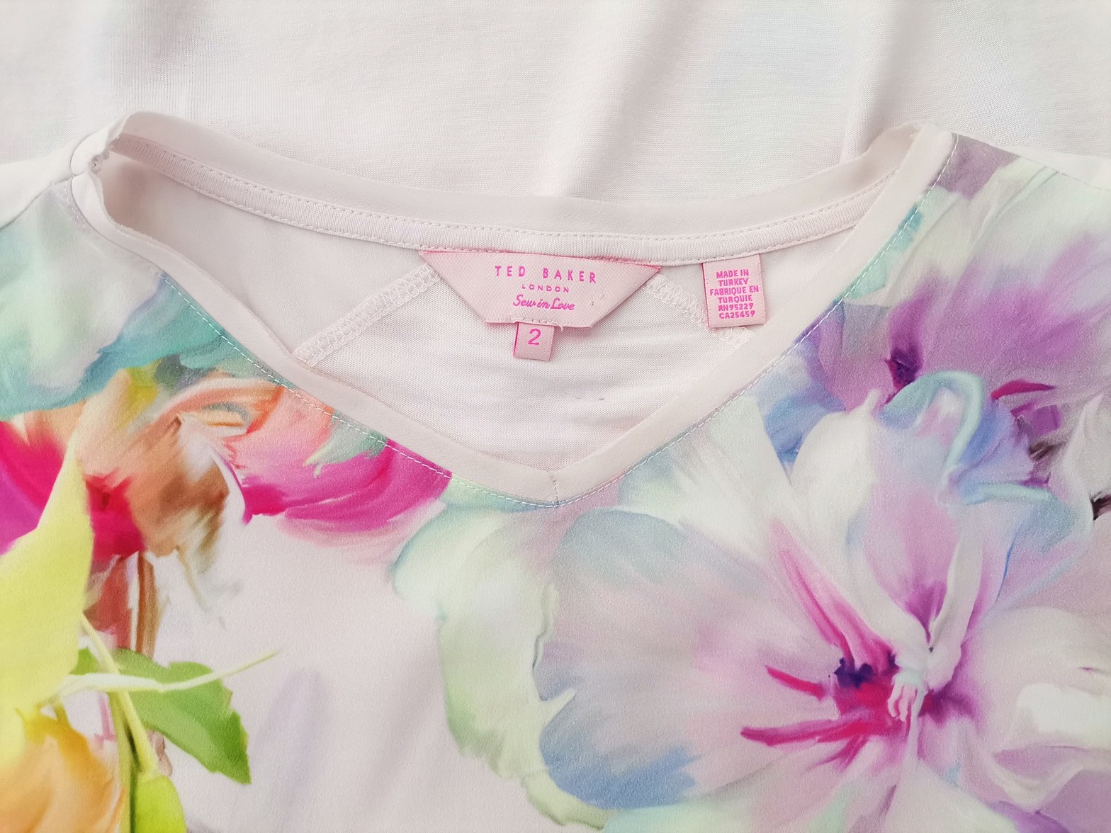 IMG_20230118_114804.jpg Ted Baker Rozmiar 2 (38) Kolor Biały Okrągły dekolt Bluzka Bezrękawnik Materiał Lyocell 100%